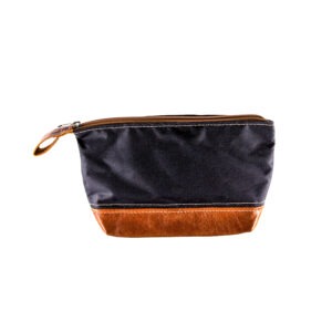 Side view of Kaalgat Toiletry Bag. Made from genuine leather and waterproof canvas